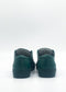 ML0118 Emerald Green sneakers, expertly handcrafted in Portugal from premium Italian leathers, as seen from the back against a plain white background.