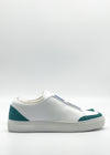 The SO0042 White & Emerald Green sneaker, featuring teal accents on the heel and toe, is handcrafted in Portugal from premium Italian leathers and is showcased from a side view against a plain white background.