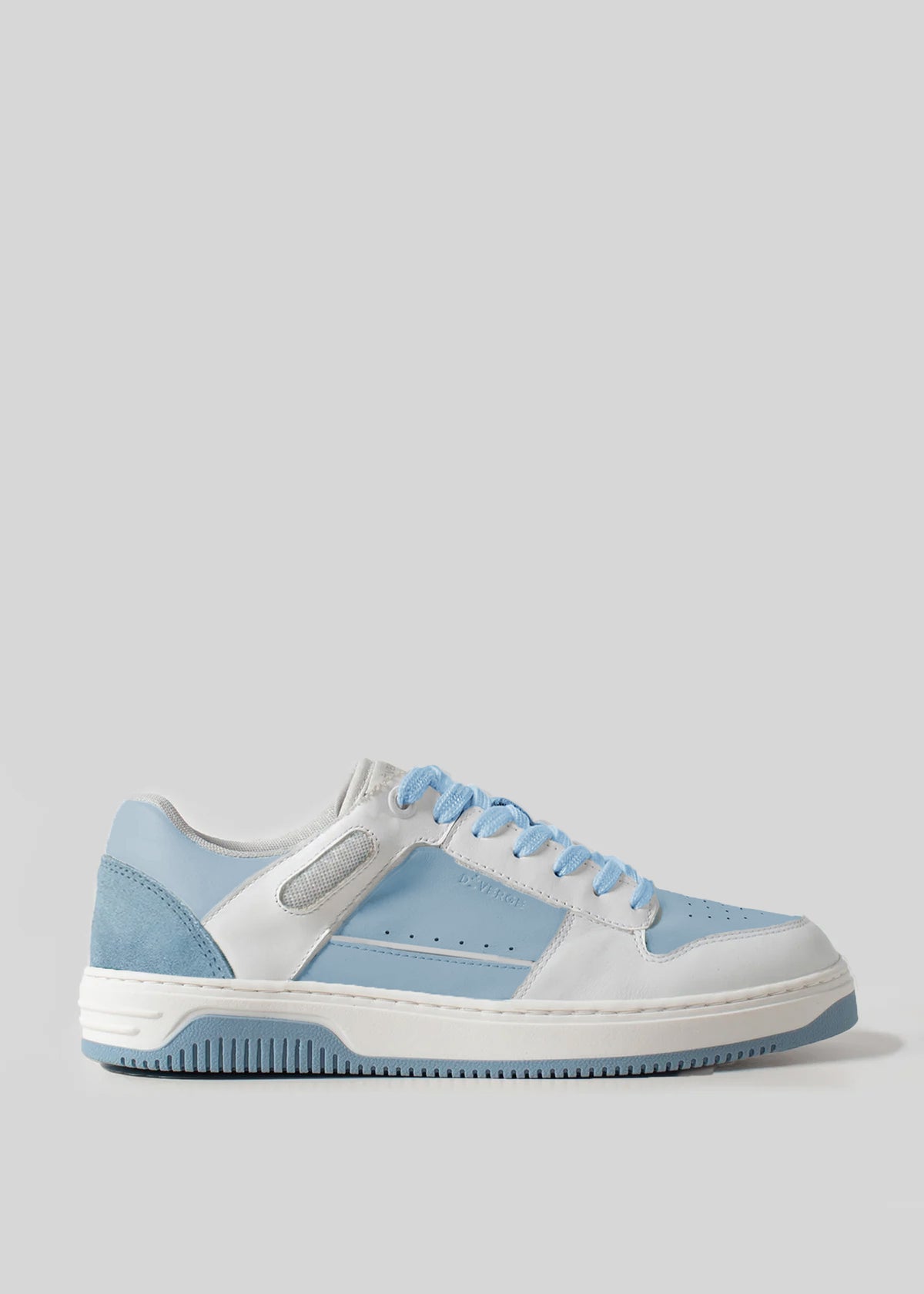 The M0008 by Pinto is a low-top retro-future sneaker with a white and light blue color scheme, featuring a white sole, blue laces, and a mix of premium Italian leathers and suede materials. Handcrafted in Portugal for unparalleled quality.