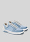 M0012 by Laila is a pair of light blue sneakers with white laces, white soles, and suede accents, handcrafted in Portugal using premium Italian leathers.