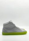 MH0117 Grey Floater & Fluorescent Yellow sneakers, skillfully handcrafted in Portugal, featuring a bright green sole and toe cap, displayed against a plain white background.