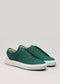 A pair of V39 Emerald Green W/ Bone sneakers, handcrafted in Portugal, resting on a plain background.