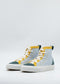 The TH0017 Blue & Green high-top sneakers are handcrafted in Portugal, showcasing premium blue, yellow, and green canvas with crisp white soles and laces against a plain background.