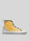 The TH0020 by Leonardo is a yellow high-top sneaker, handcrafted in Portugal with premium canvas. It features gray accents, a white sole, and visible eyelets against a plain gray background.