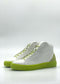 MH0137 White & Yellow high-top sneakers featuring bright green soles and heel accents, set against a plain background and handcrafted from premium Italian leathers.