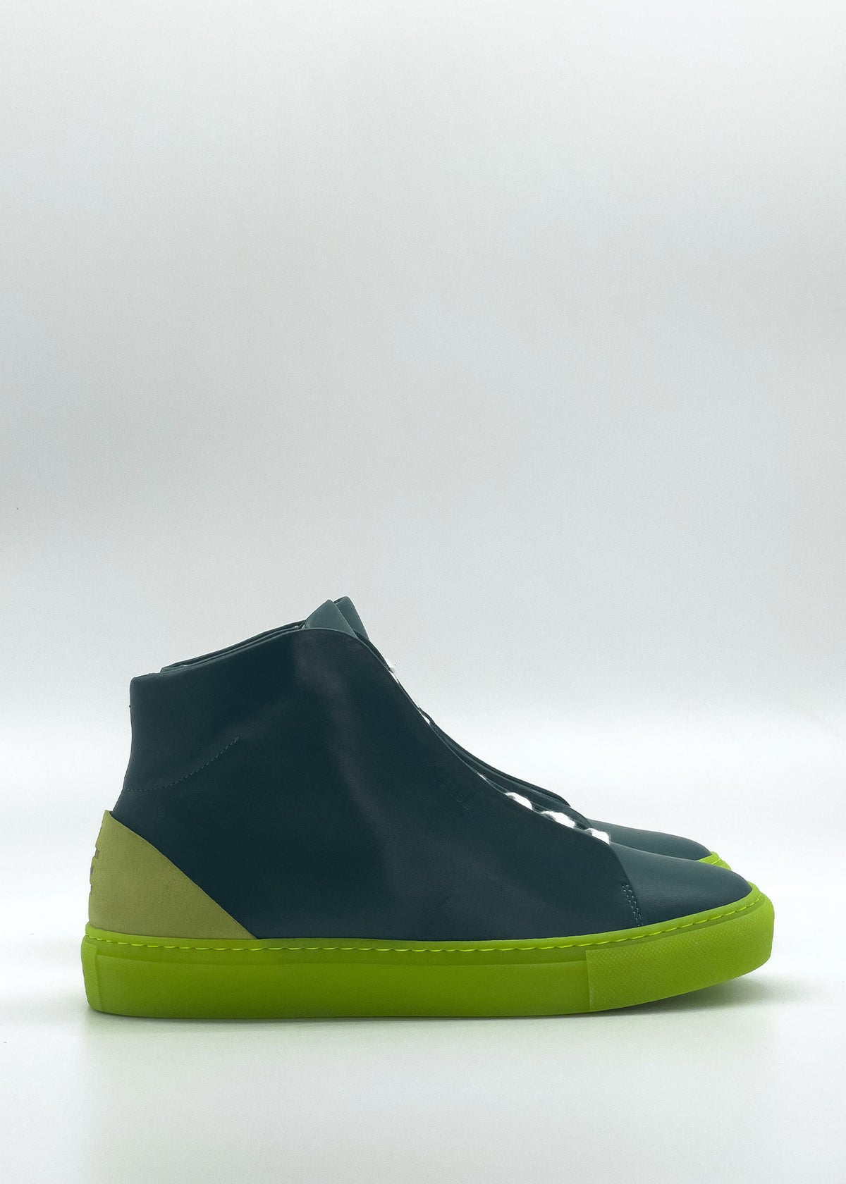 A side view of the MH0139 Emerald Green & Lime sneaker, ethically made to order with a lime green sole and a light green heel accent, showcasing premium Italian leathers.