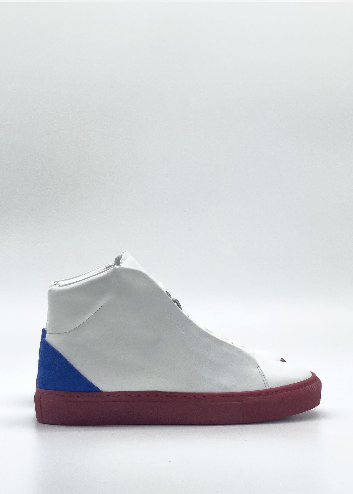 Introducing the MH0141 White & Red: a white high-top sneaker expertly crafted from premium Italian leathers. It features a striking red sole, red toe detail, and a blue heel accent. Ethically produced and meticulously designed for the discerning footwear enthusiast.