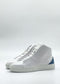 MH0143 White & Blue high-top sneakers, crafted from premium Italian leathers and ethically made to order, showcased against a plain background.