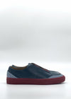 Side view of the SO0039 Blue & Red sneaker, a low-top design handcrafted in Portugal, set against a plain background.