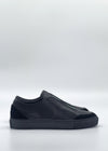 Product Data: SO0040 Black & Green - A pair of black leather slip-on sneakers, handcrafted in Portugal with a textured finish using premium Italian leathers, displayed against a plain white background.