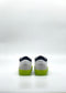 A pair of ML0111 White & Lime sneakers, ethically made to order using premium Italian leathers, is displayed against a plain white background.