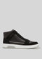 The V5 Black is a sleek black high-top sneaker featuring a white sole and black laces, crafted from premium Italian leathers and expertly handcrafted in Portugal.