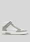 V8 White W/ Plaster high-top sneaker, meticulously handcrafted in Portugal, showcasing a white leather body with gray suede accents, complemented by white laces and a textured rubber sole, set against a plain background.