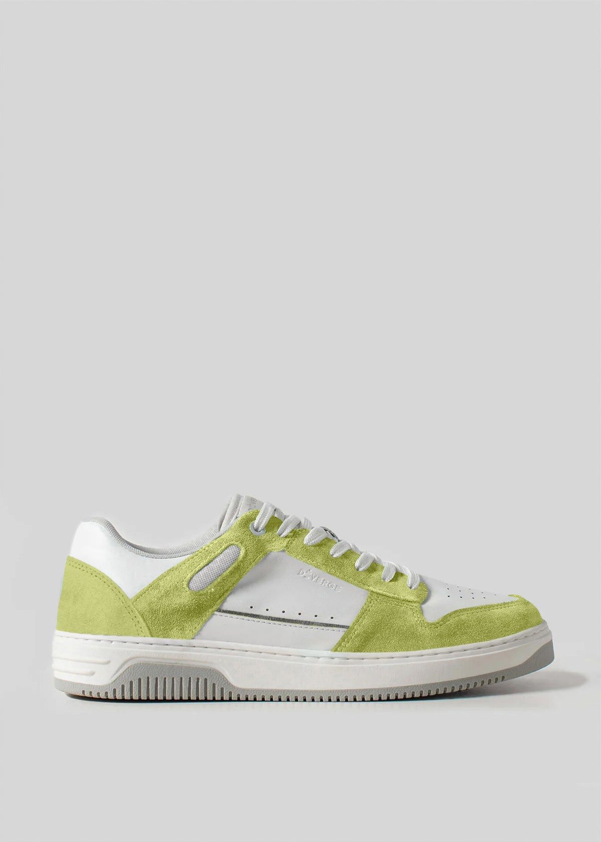 The V10 Brat sneaker showcases premium Italian leathers in a luxurious blend of white and green, complemented by green suede accents and white laces, set against a stylish grey background.