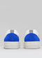 Rear view of two white low top sneakers with blue accents and "Novo Nordisk" logo on the heel.