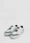 A pair of SO0028 White W/ Blue slip-on sneakers, ethically made to order, on a white background.