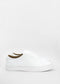 The ML0038 White Leather sneakers are a pair of white low-top shoes, meticulously handcrafted from premium Italian leathers, featuring white laces and a plain design, showcased against a pristine white background.