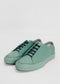 A pair of ML0068 Pastel Green Floater with a minimalist design, featuring side lace-up details, handcrafted in Portugal using premium Italian leathers, placed on a plain white background.