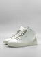 The MH0115 White Leather W/ Grey, a pair of white high-top sneakers with a minimal design, featuring gray laces and accents and handcrafted in Portugal using premium Italian leathers, are displayed against a plain background.