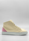 The MH0123 Beige Leather W/ Pink high-top sneakers, featuring beige uppers, light pink accents on the heels, and white soles, are ethically made to order using premium Italian leathers and set against a plain background.