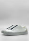 A pair of ML0091 White Vegan sneakers with grey accents, handcrafted in Portugal from premium Italian vegan leathers, displayed against a plain light grey background.