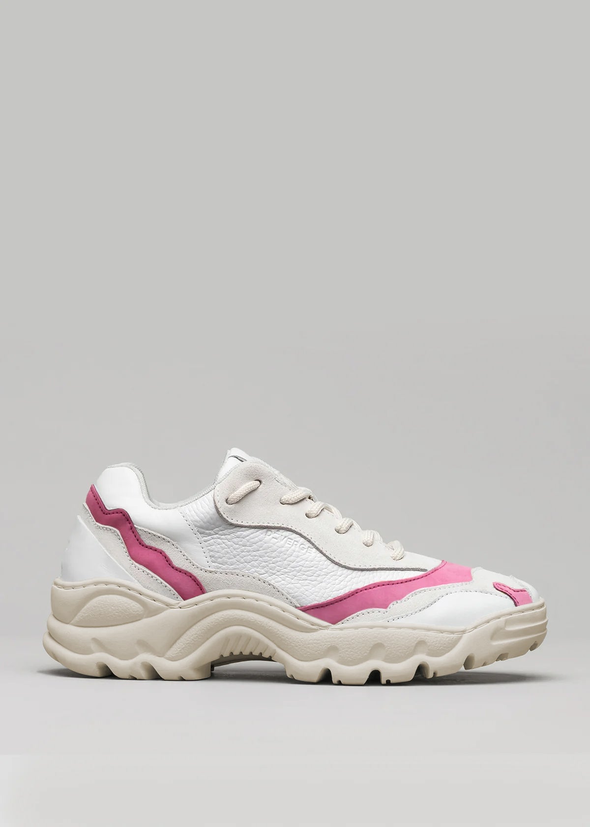 The V26 Mix Leather Fuchsia is a color block sneaker made from premium Italian leathers, handcrafted in Portugal, featuring a white and pink design with a chunky sole set against a plain background.