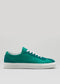 The V3 Emerald Green is a low-top sneaker featuring white laces and a sole, handcrafted in Portugal from premium Italian leathers, and showcased against a plain light gray background.