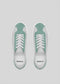 Pair of V9 Grey W/ Pastel Green low-top sneakers, featuring white laces and handcrafted in Portugal from premium Italian leathers, presented from an overhead view on a plain background.