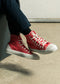 girl wearing geranium premium canvas multi-layered high sneakers