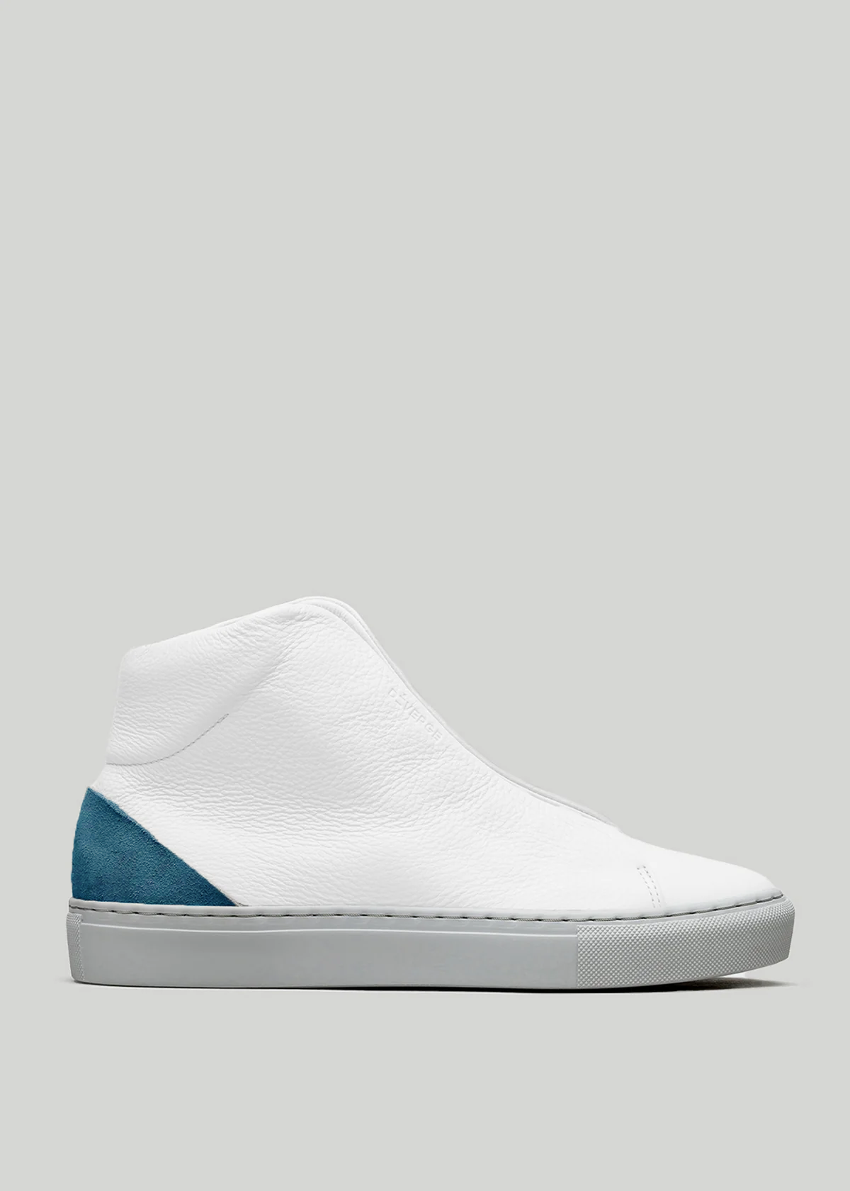 A white high-top sneaker (V40 Petrol Blue W/ Grey) with a grey sole and blue suede detail on the heel, handcrafted in Portugal using vegan synthetic materials, displayed on a plain light grey background.
