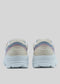 Rear view of a pair of colorful, premium handcrafted sneakers, L0018 by Bruna, with white soles displayed against a plain background. These custom shoes feature a mix of pastel colors, including beige, pink, and blue.