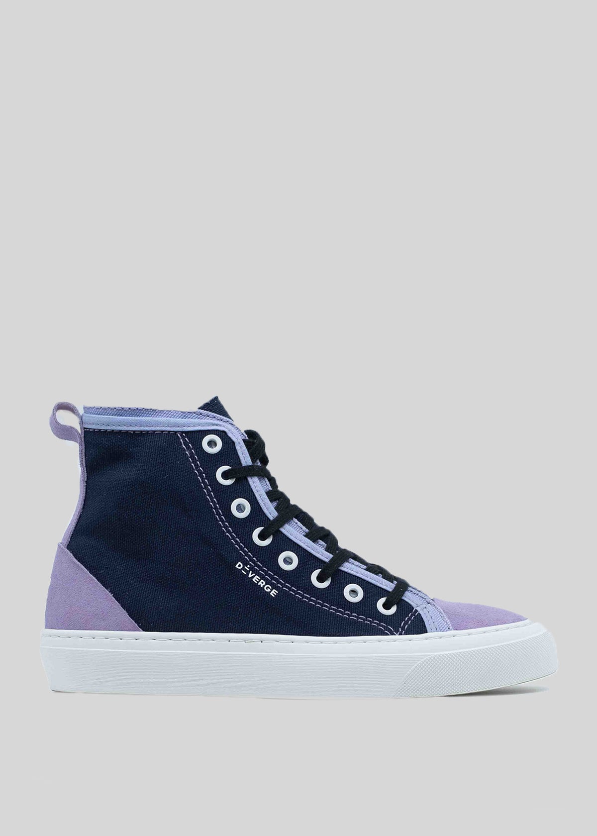 The TH0019 by Linda is a high-top sneaker featuring black and purple panels, black laces, white eyelets, and a white rubber sole, all handcrafted in Portugal.