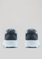 Rear view of a pair of L0019 by Paulo premium handcrafted sneakers in white and dark gray, placed against a plain light gray background.