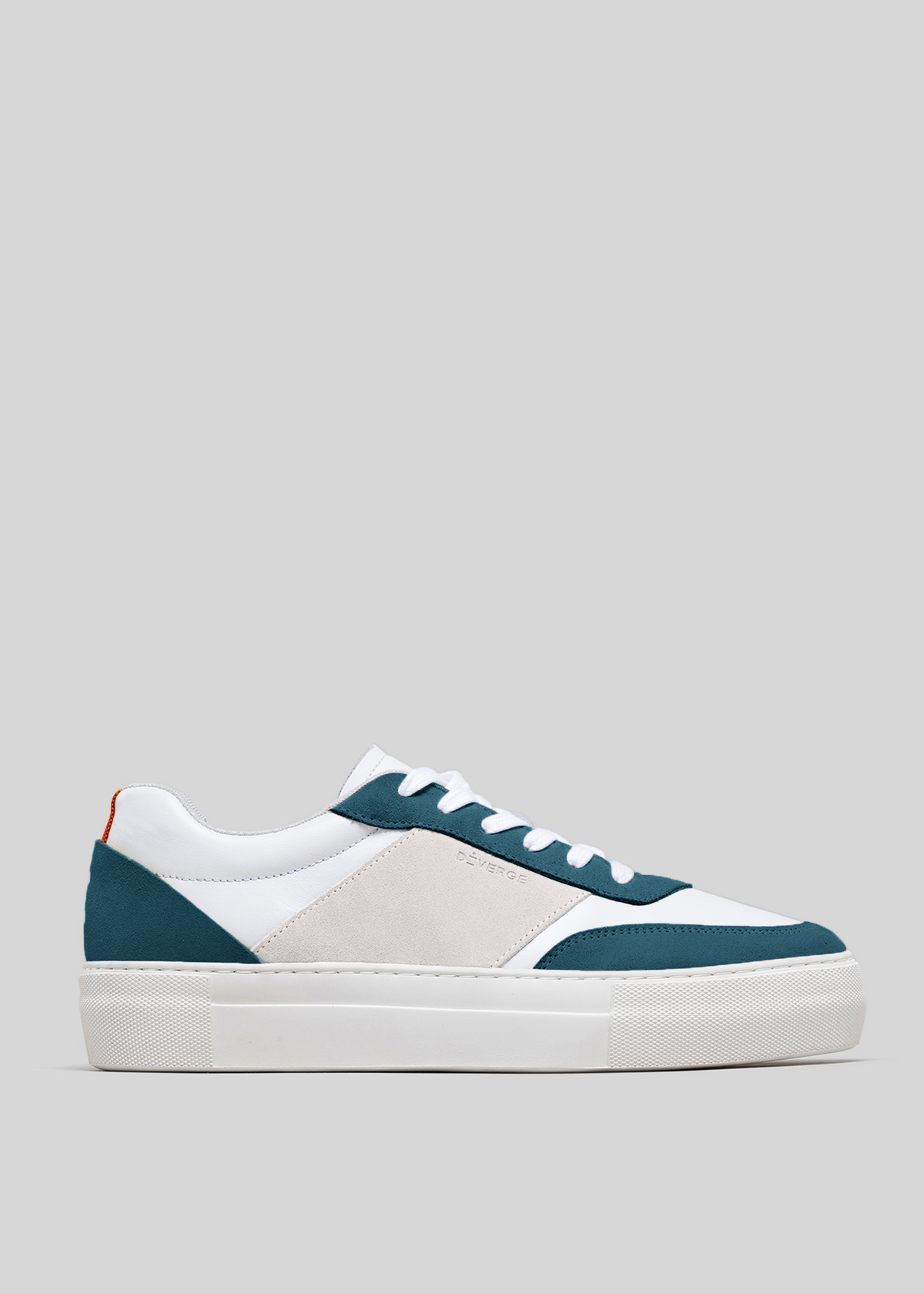 A V28 White & Petrol Blue with a white sole and white laces, handcrafted in Portugal using premium Italian leathers, is displayed against a plain gray background.